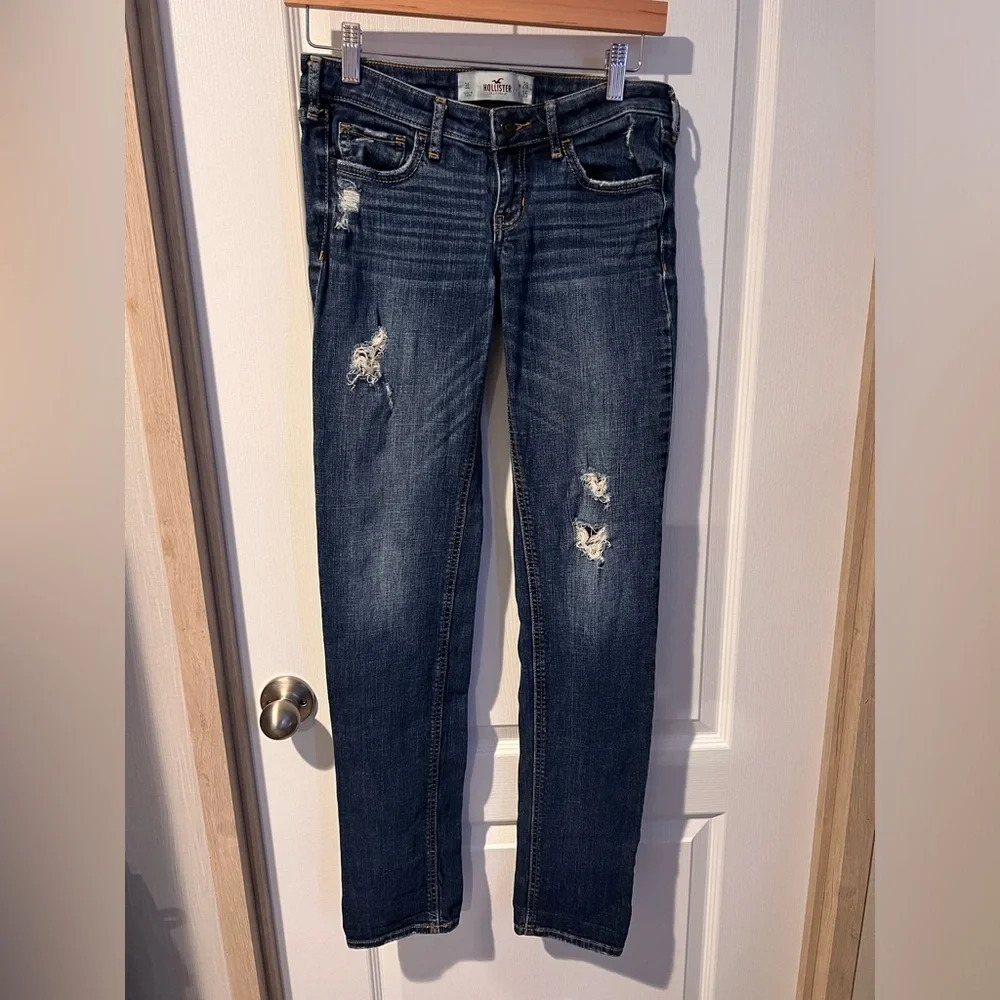 Hollister denim size w26, l35, with factory distressing and wiskering.
